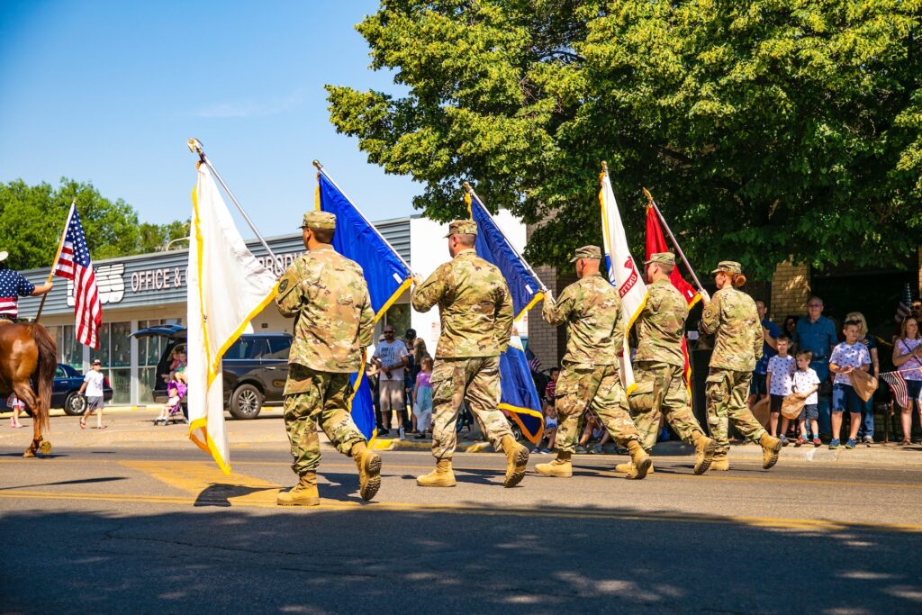 Veterans holding flags in a parade